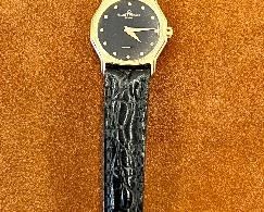 Item 20:  14K Baume & Mercier Watch:  $275