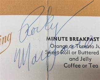 ROCKY MARCIANO AUTOGRAPHED MORRISON HOTEL MENU,

NO COA BUT ROCKY MARCIANO WAS KNOWN TO FREQUENT,

AS MANY STARS OF THE DAY WOULD,

THE MORRISON HOTEL  CHICAGO, ILLINOIS IN THE

1950s & EARLY 1960s BEFORE THE DEMOLITION,