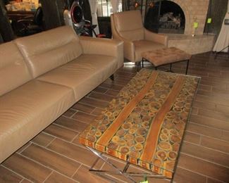 7K originally paid for Natuzzi Sectional leather sofa and matching chair. Asking $2800 NOW!  Amazing price for something so gorgeous.  We also have up for sale 2 round end tables with matching coffee table and sofa table.