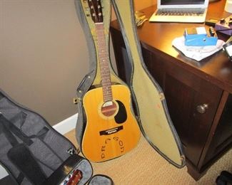 Carlos Guitar with Gibson strap and original case.