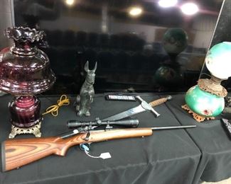 TV, oil lamps, rifle with scope.   Orlando For Sale
