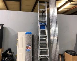 Doors, rug pads, large ladder.  For Sale Orlando Auction