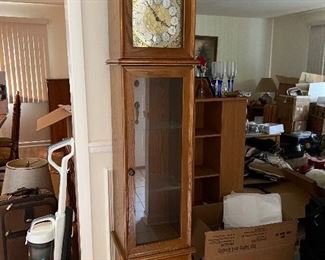 Grandfather clock with built in curio cabinet 