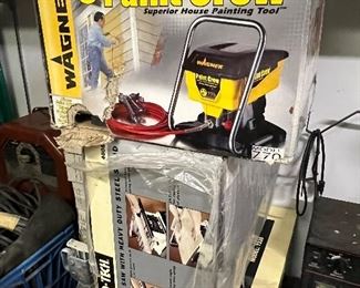 Wagner spray painter, house painting tool.  Pro Tech, table saw, heavy duty and brand new. 