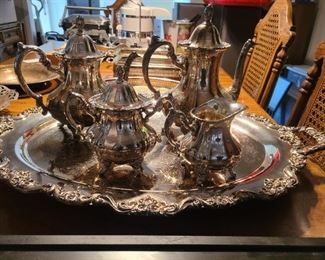 Silver plated coffee and tea set with oversized serving tray.