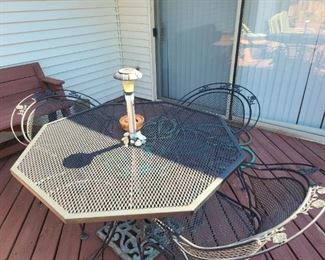 Octagon  wrought iron table with 3 chairs, Cast Iron Umbrella stand 