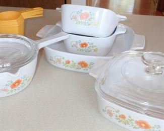 PYREX COVERED ORANGE FLOWER