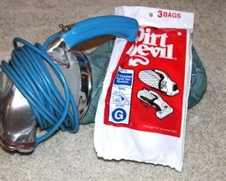 Royal Dirt Devil electric hand vacuum.