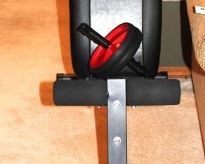 Marcy exercise bench (like new condition) and ab roller.