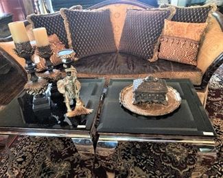 Ends are curved; chrome side tables (or put the two together for a coffee table)