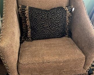 Custom upholstered chair; decorative pillow