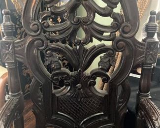 Highly carved antique arm chair