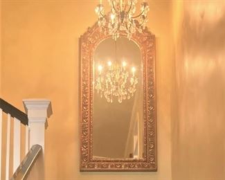Elaborate gold mirror