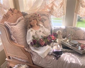 Caned lounge; life size doll