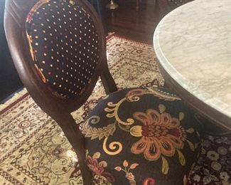 One of four custom upholstered chairs