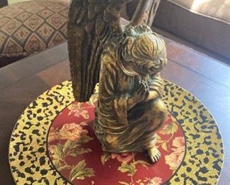 One of two kneeling angels  .  .  .  could be used as bookends