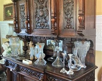 Intricately carved antique cabinet
