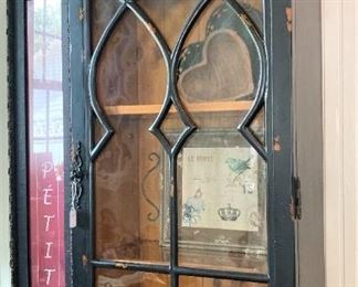 Tall black narrow distressed cabinet