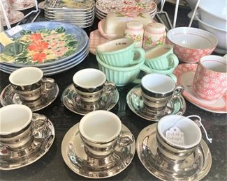 Cups and saucers of all colors and styles
