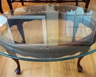 9______$150 
Glass top mahogany coffee table oval 16Tx43Lx29