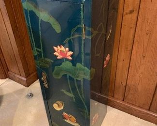 There are 2 of these tall chests with shelving inside