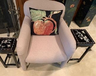 There are 2 of these custom upholstered chairs