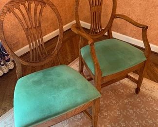 Picture to come of Keller William dining table with leaf and custom pads, in a antique oak finish. There are 2 arm chairs and 6 side chairs