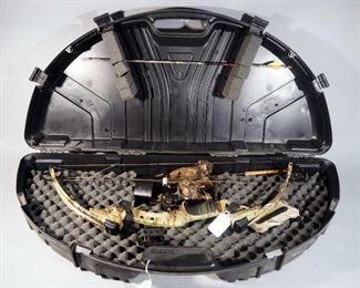 Buckmaster Pro Compound Bow, 29" Draw Length, 70# Draw Weight, With Quiver, Arm Guard, 1 Arrow And Camo Hood, In Plano Bow Guard Case
