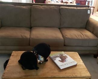 Sofa w/nail heads, 3 cushion, antique wooden trunk in front of sofa