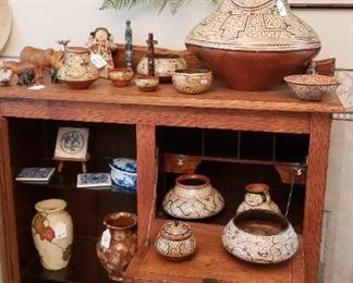 Oak drop down secretary with bookcase.  Pottery from Peru by the Shipibo Indians