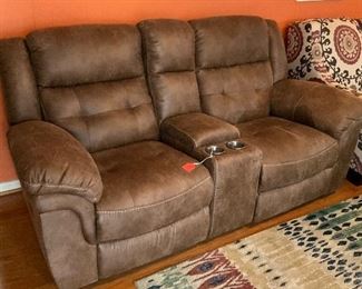 Dual Rocker/Recliner, less that a year old.