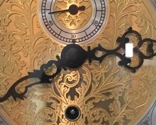 face of grandfather clock