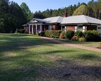All brick ranch 5 plus bedrooms, 3 full baths, 2 full kitchens sitting on 7.5 acres for sale. Great inlaw suite or rental. 1100 sq ft storage climate controlled and much more...for sale. 