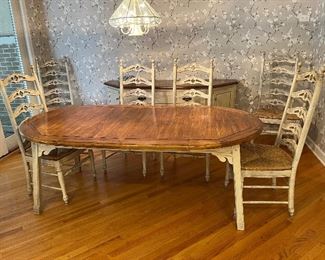 Kitchen table with 1 leaf (shown installed), 2 captains chairs and 4 side chairs