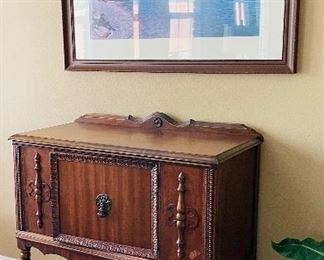 19______$225 	
Small wood cabinet • 45Hx 34Lx 16D