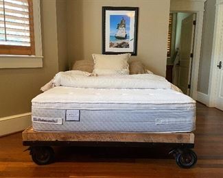 29______$450 
Sealy Thorton Queen size mattress on Industrial platform
• (14"H)