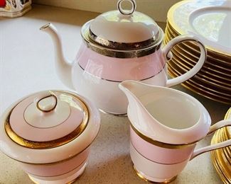 72______$295 
Mary Kay China Gold encrusted band, pink rim 10cups saucers +
  6 serving pieces 
10 dinner + 10 salad + 10 b&B