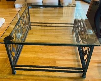 76______$250 
Iron base & glass top coffee table • 20Hx50Wx37D