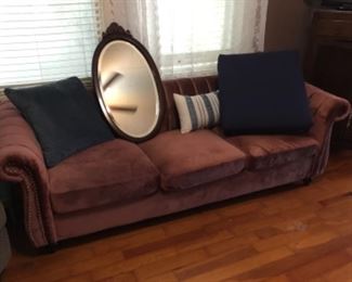 Sofa, pillows & oval mirror