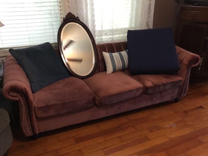 Sofa, pillows & oval mirror