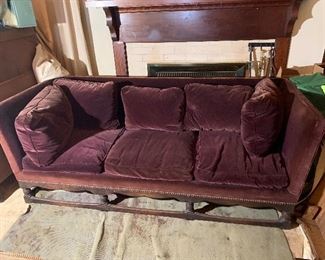 Purple velvet couch with wooden base. 78" L x 32" W x 30" H Some fading around the edging. $250