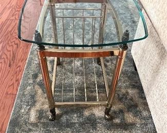 Glass topped brass table