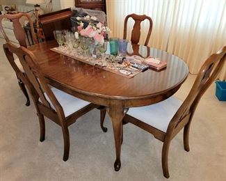 Dining table and six chairs. Excellent condition. Very solid and high quality.