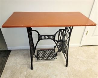 Antique sewing machine stand made into a table