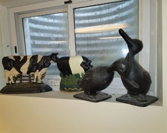 Cast iron cows and ducks