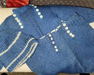 Hand knitted baby outfit