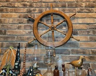 Ships wheel. Antique / vintage lamps. White flame and Eagle burners