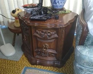 Octagon shaped and table with carving on the doors 28x28