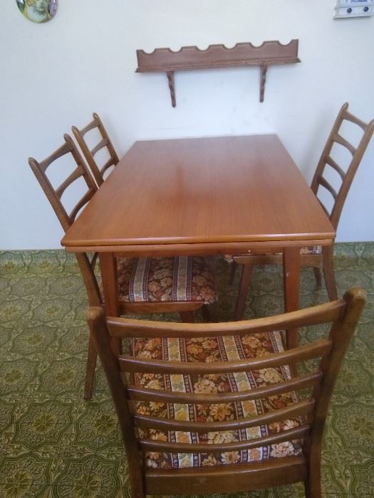 Mid Century Modern hidden leaf table and 4 chairs approx 42" x 29