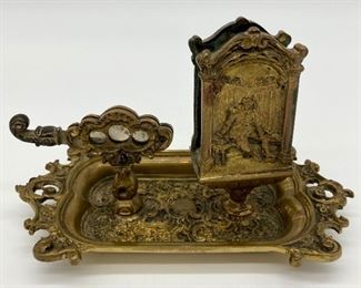 Antique brass ashtray with cigarette/cigar cutter and match holder